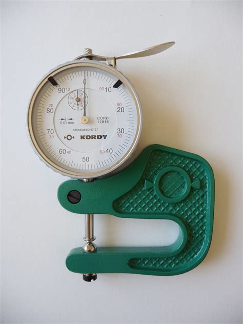 measures thickness of objects|measuring thickness of a gage.